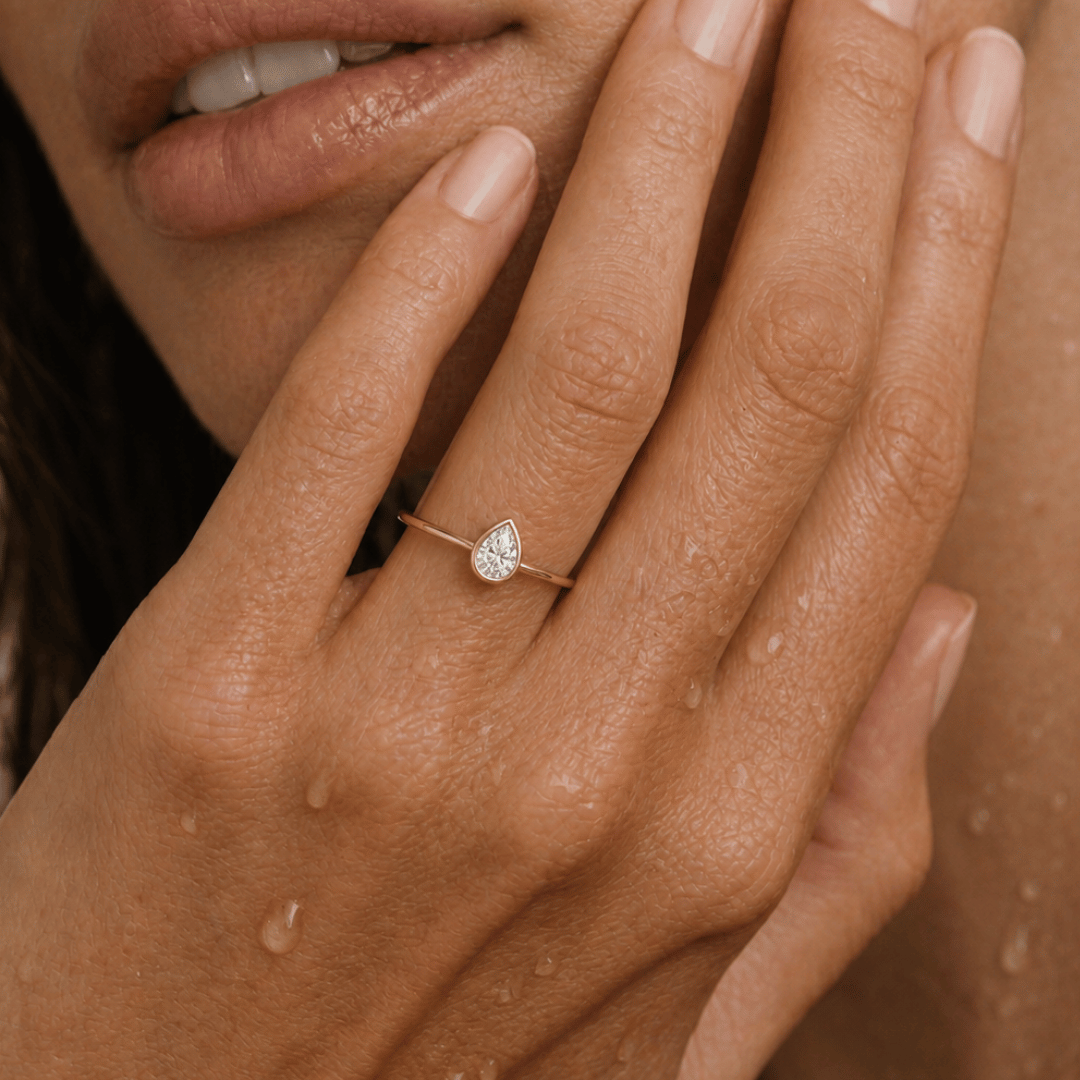 Women's Thin Band Ring with Pear-Shaped Stone