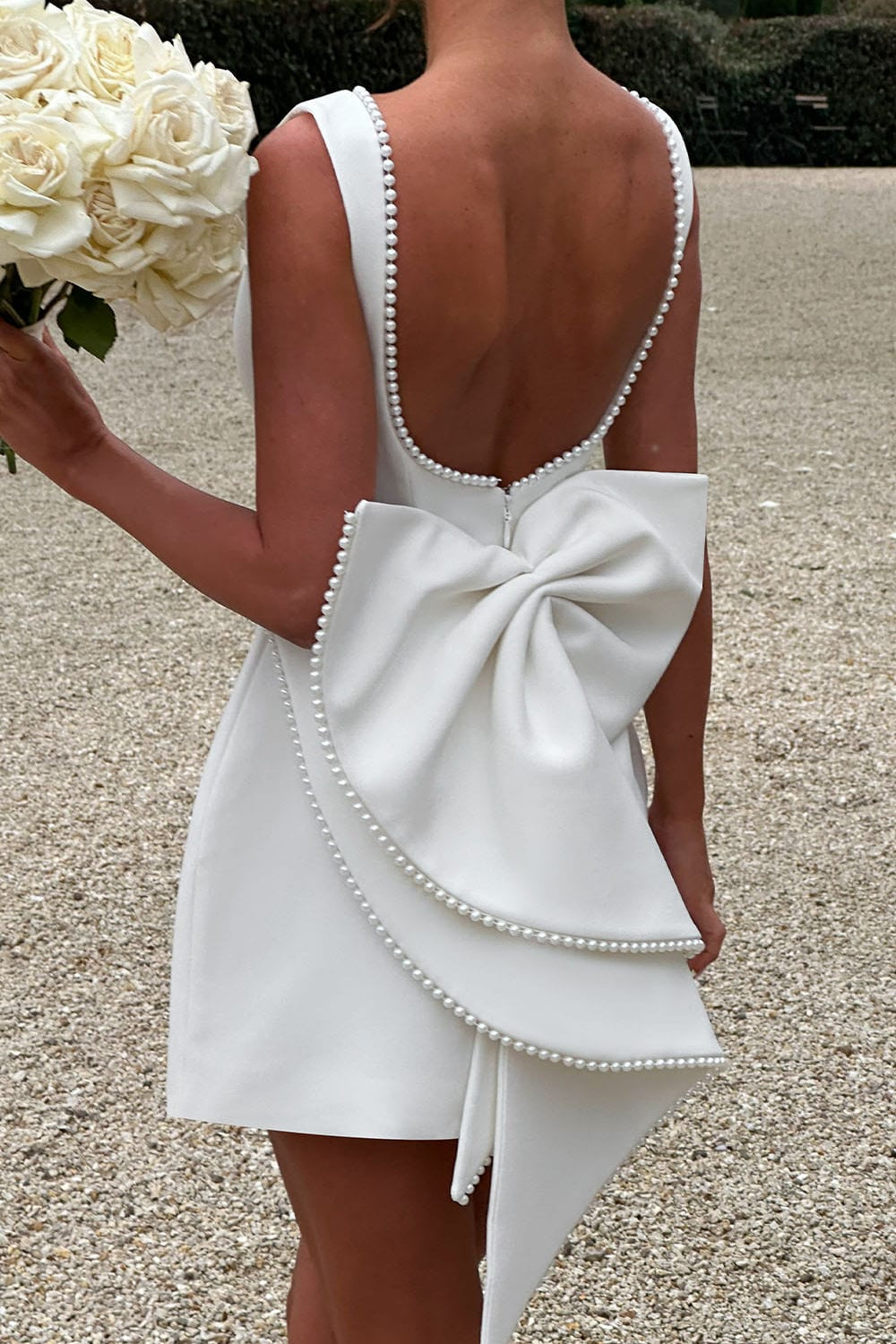Women's A-Line Mini Dress with Pearl Trim Backless Design and Statement Bow