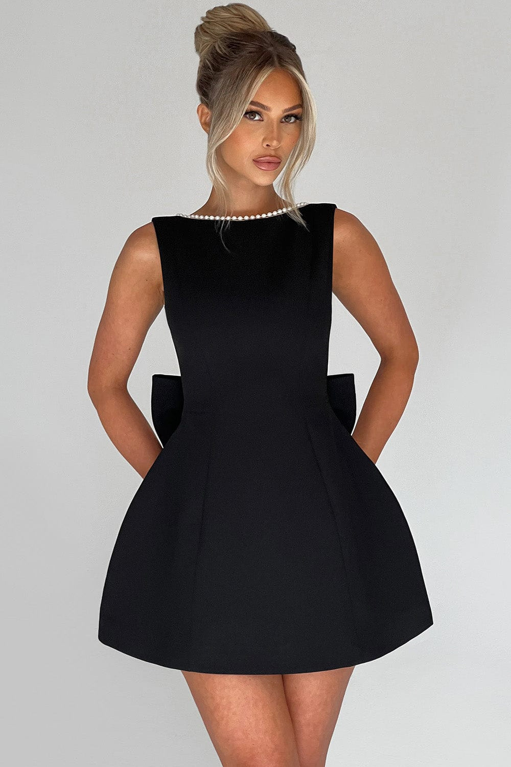 Women's A-Line Mini Dress with Pearl Trim Backless Design and Statement Bow