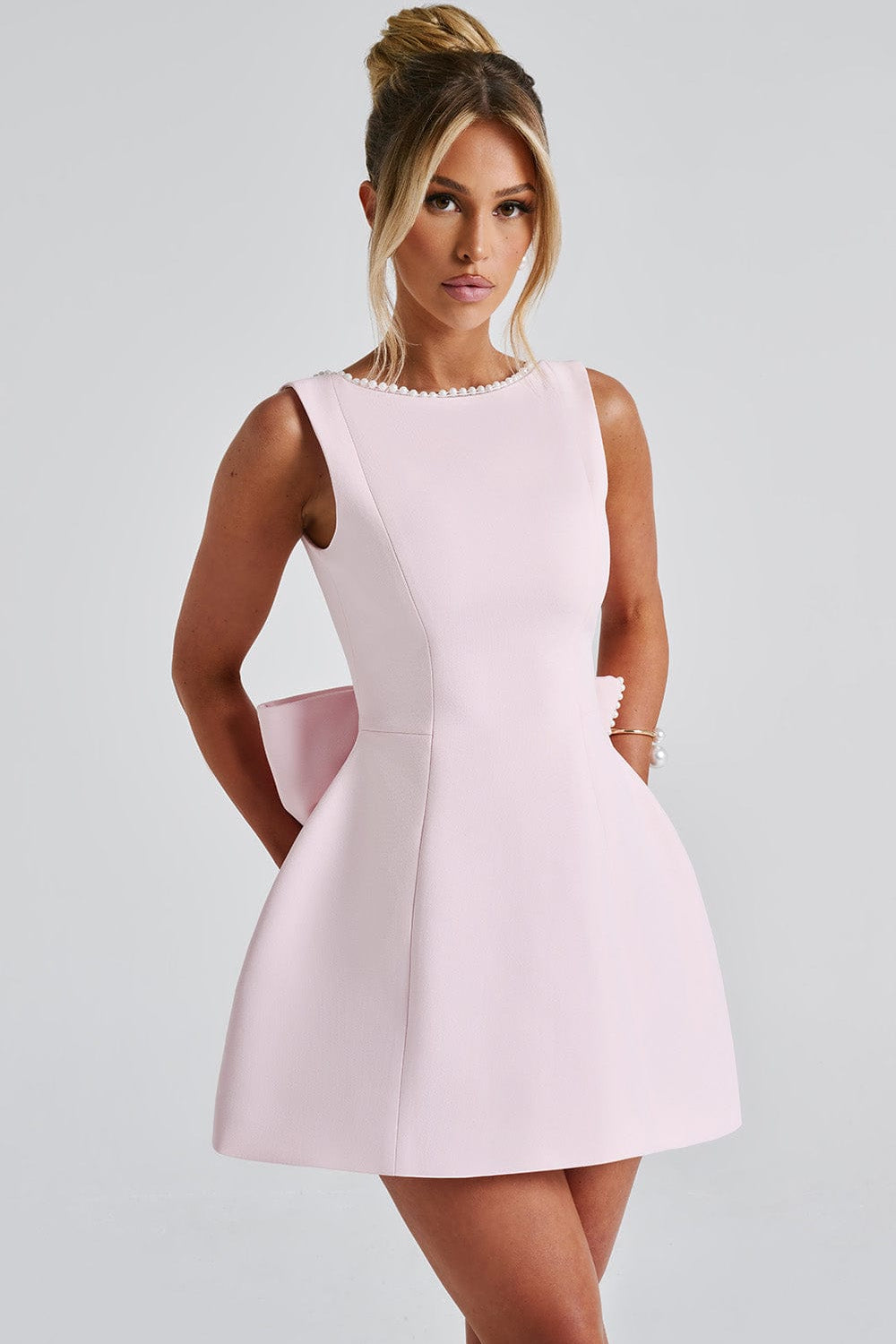 Women's A-Line Mini Dress with Pearl Trim Backless Design and Statement Bow