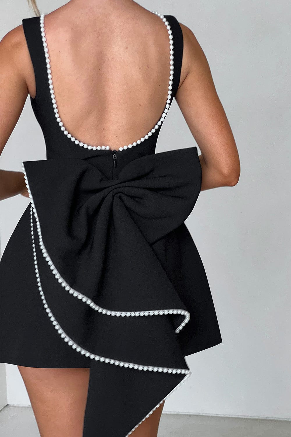 Women's A-Line Mini Dress with Pearl Trim Backless Design and Statement Bow