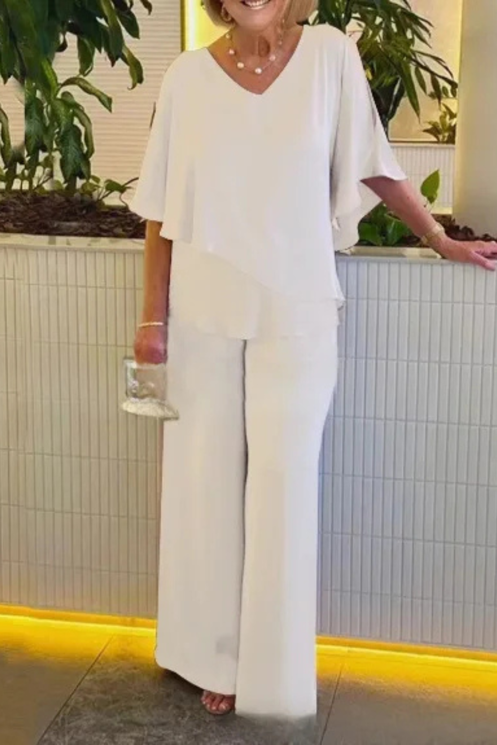 Women’s Two-Piece Set with Asymmetric Tiered Top and Wide-Leg Trousers