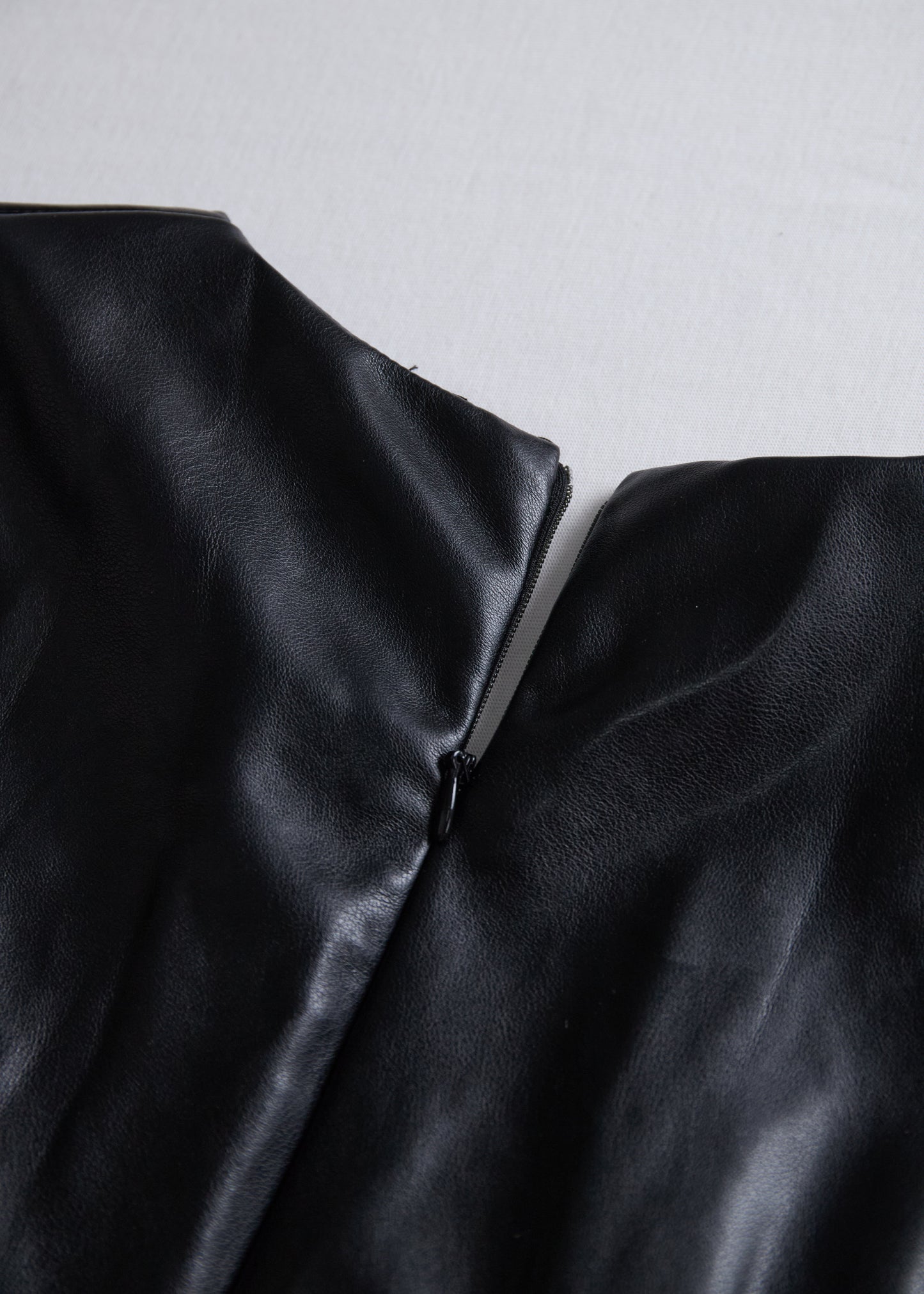 Ceylan Women’s Faux Leather Wrap Mini Dress with V-Neck Silhouette