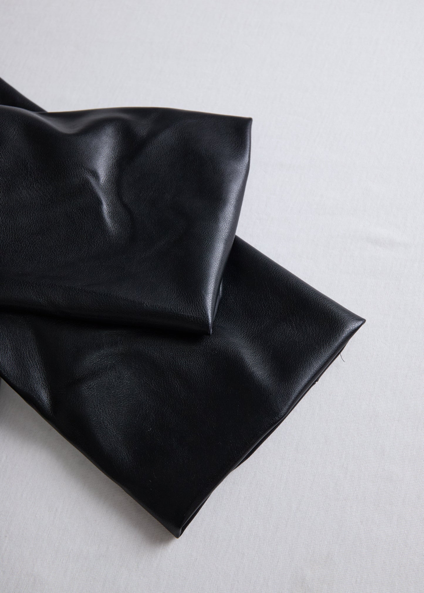 Ceylan Women’s Faux Leather Wrap Mini Dress with V-Neck Silhouette