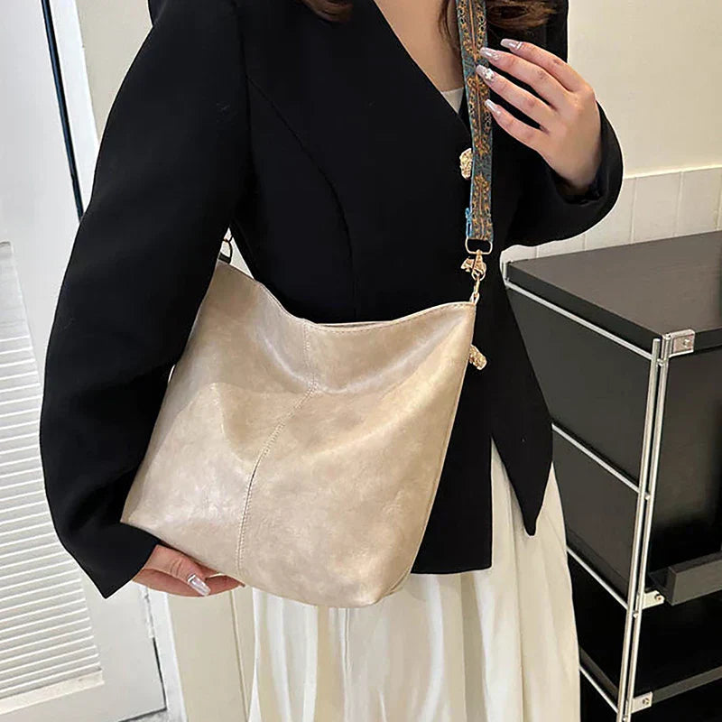 Women's Bohemian Shoulder Bag with Patterned Guitar Strap and Spacious Slouchy Silhouette